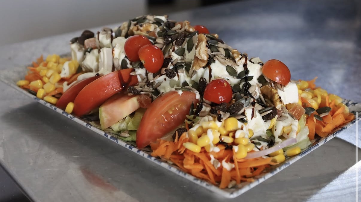 Greek salad with feta, walnuts and balsamic
