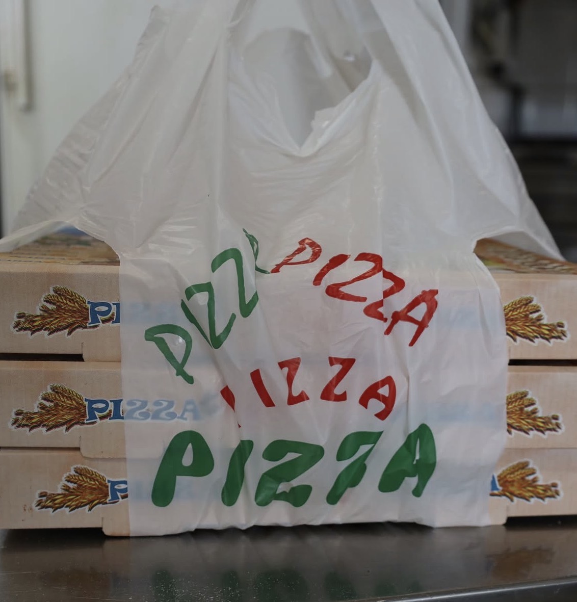 Pizza takeaway bag with stacked boxes