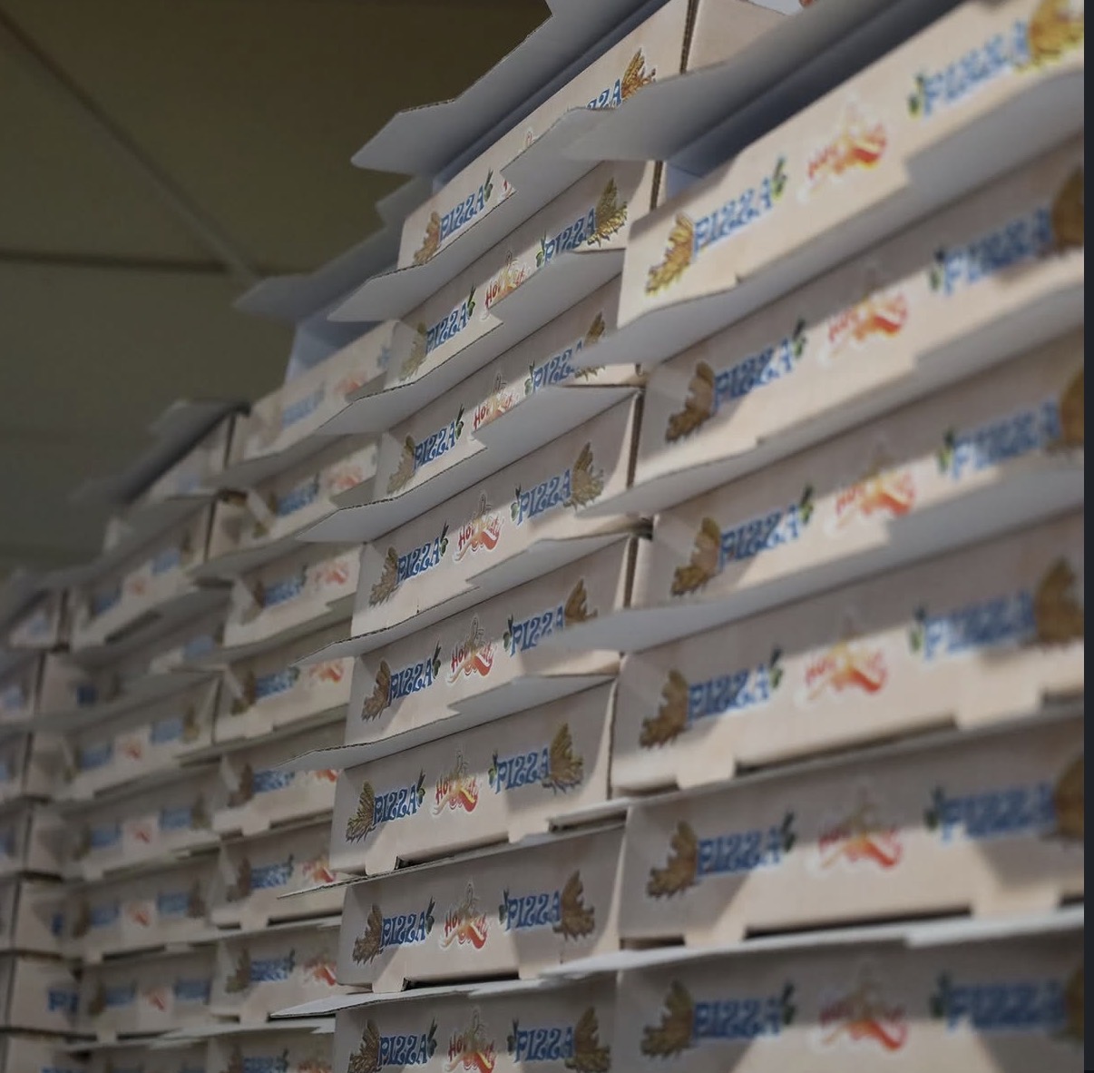 Stacks of pizza boxes ready for delivery