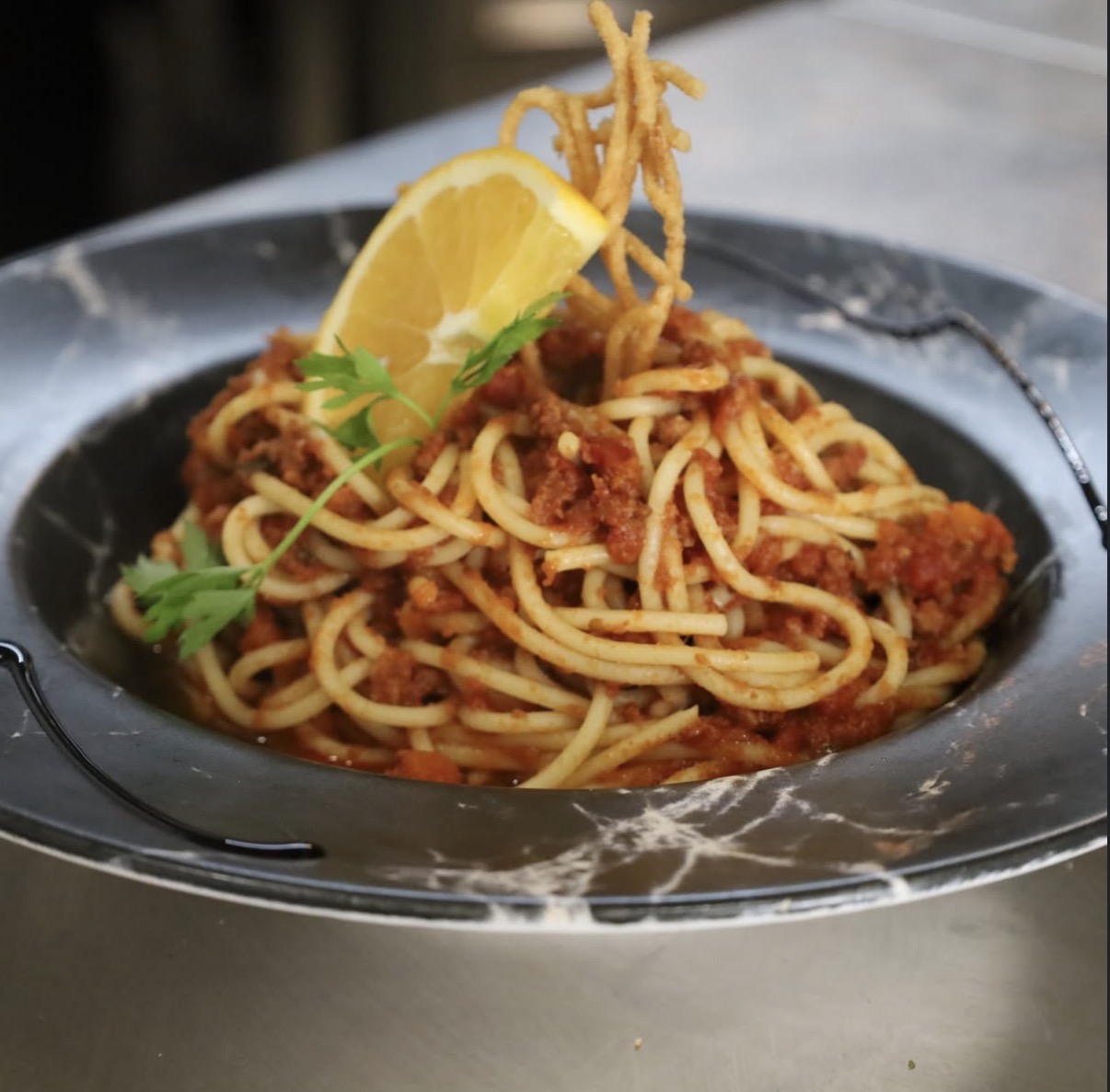 Spaghetti bolognese with lemon