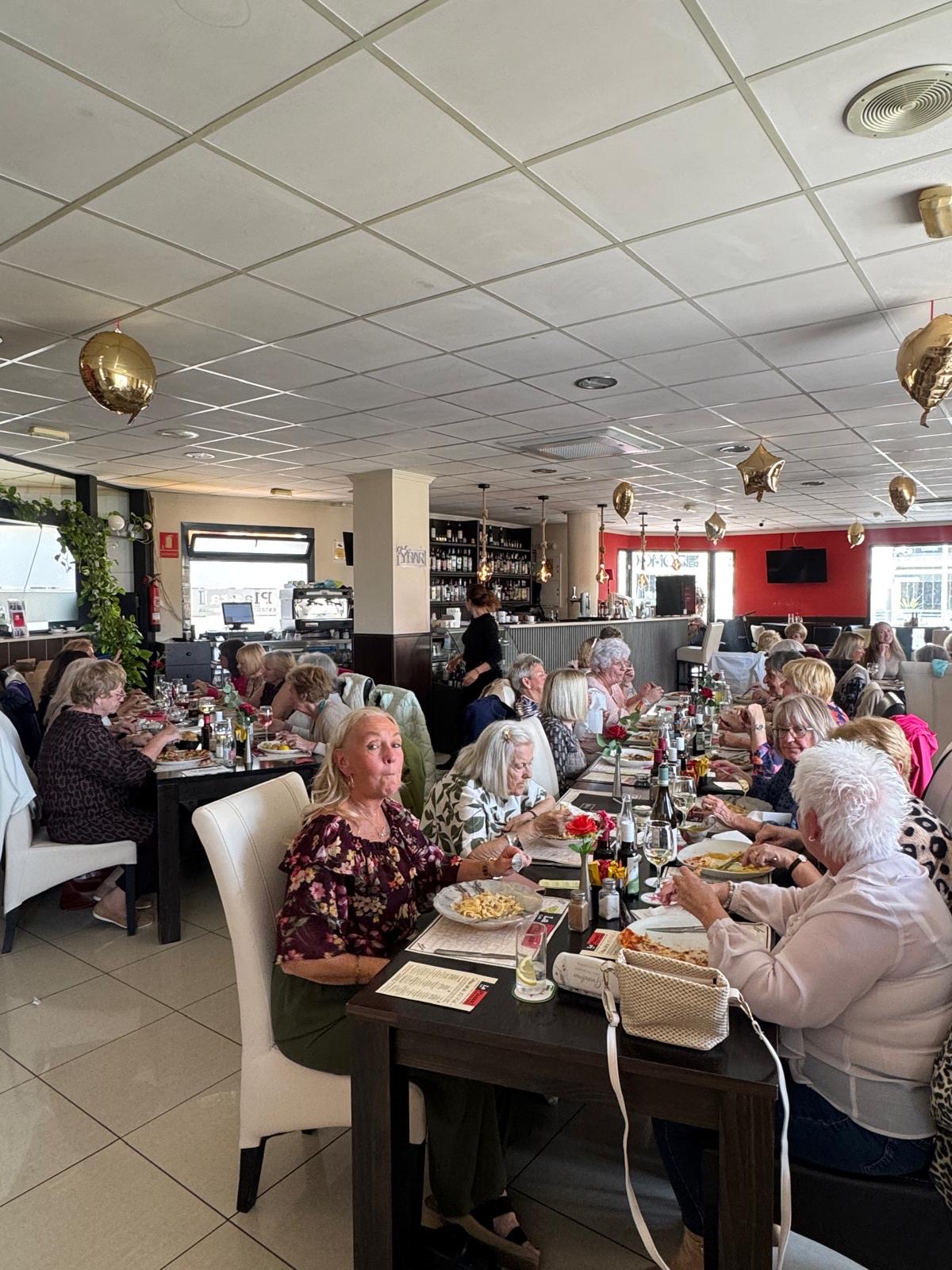 Busy dining room at La Plazza II